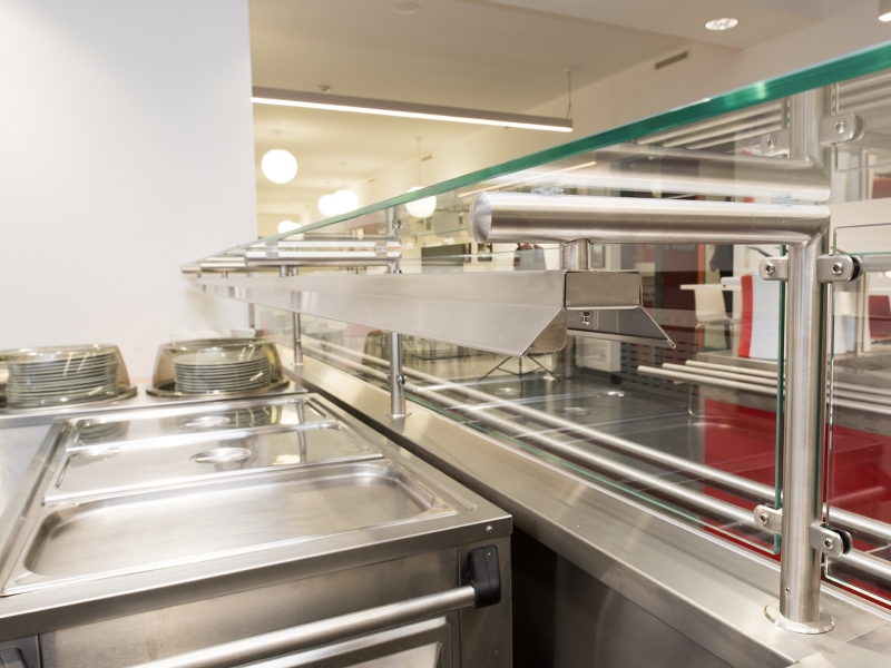 Ausgabeaufsatz und Hustenschutz mit Glas und L-förmigem Rundrohrsteher in Edelstahl und Wärmestrahler/Beleuchtung