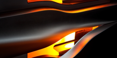 Makroaufnahme von Champagnerkühlschrank in Edelstahl mit oranger Beleuchtung